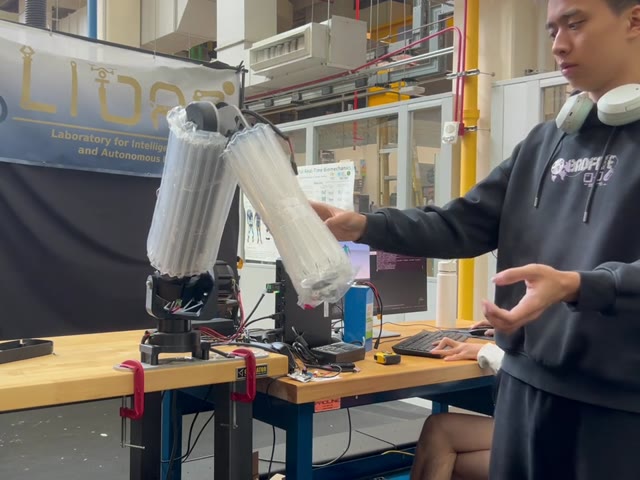 A successful hardware test of the whole-body RL controller trained in simulation.