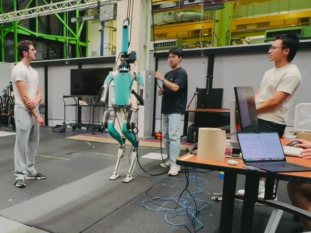 The team tests the augmented humanoid in the lab.